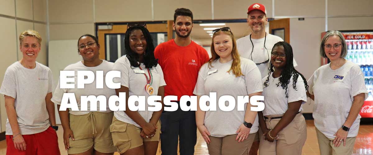 EPIC Ambassadors with students walking out of the College of Education building.
