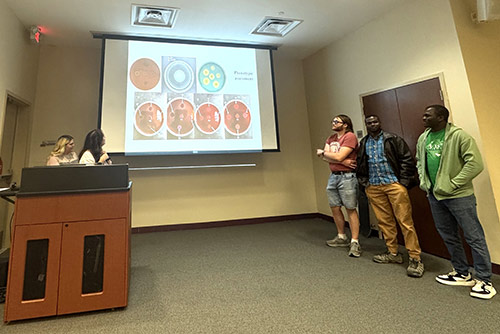 BMS students present at a TriBeta Biological Honor Society meeting.&nbsp;